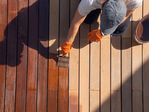 Restaining a timber deck from weathered grey to fresh timber